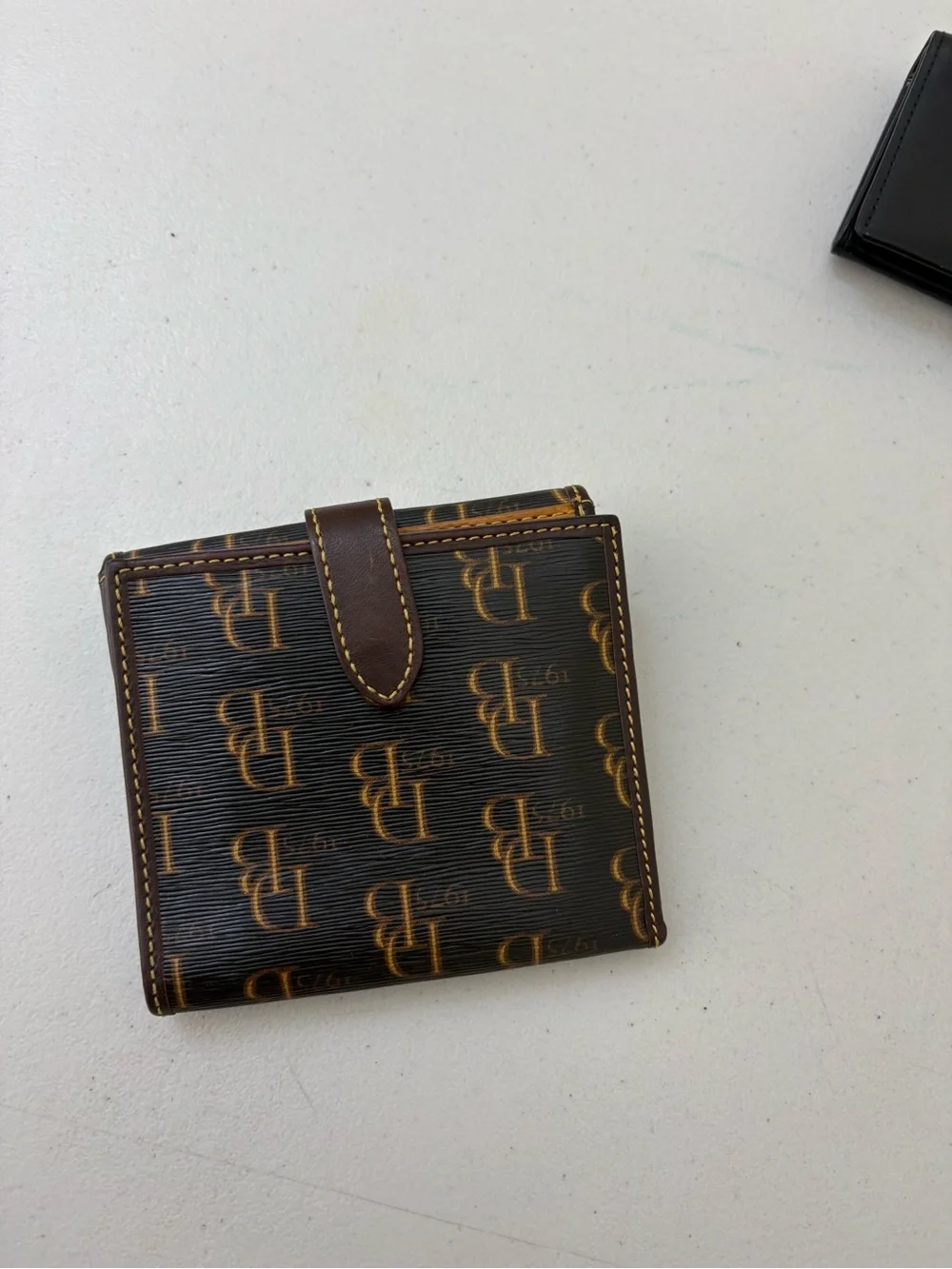 Dooney & Bourke Dark Brown Monogram Fold Wallet with Gold Logo Plate